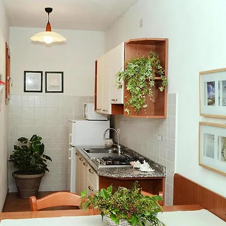 Terraced House In The Ca' Del Pino Complex With Communal Pool In Bibione